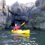 Paddling out from under the arch at Rumblekirn